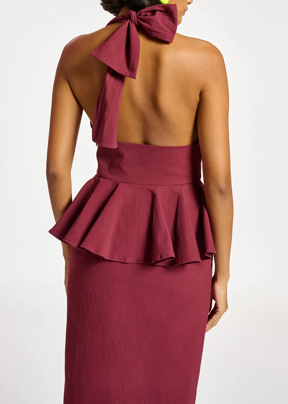 Burgundy halterneck dress with peplum