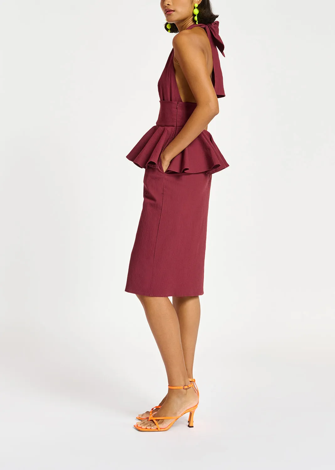 Burgundy halterneck dress with peplum