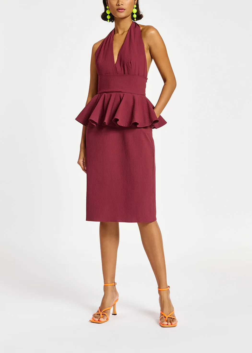 Burgundy halterneck dress with peplum
