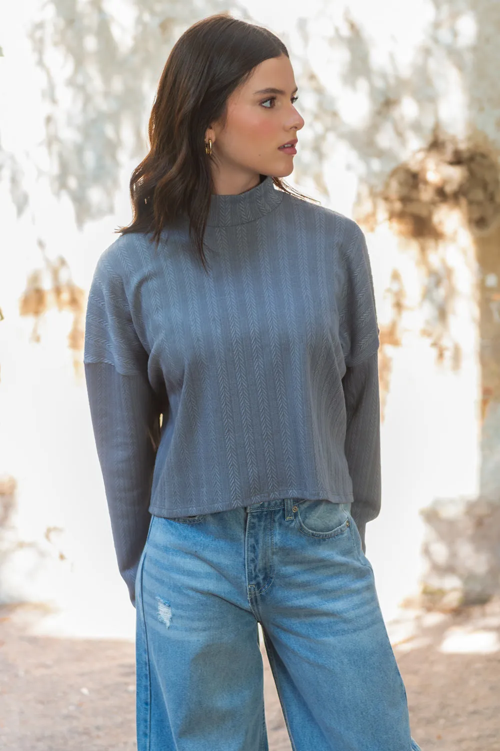 Jersey corto oversized de cuello alto