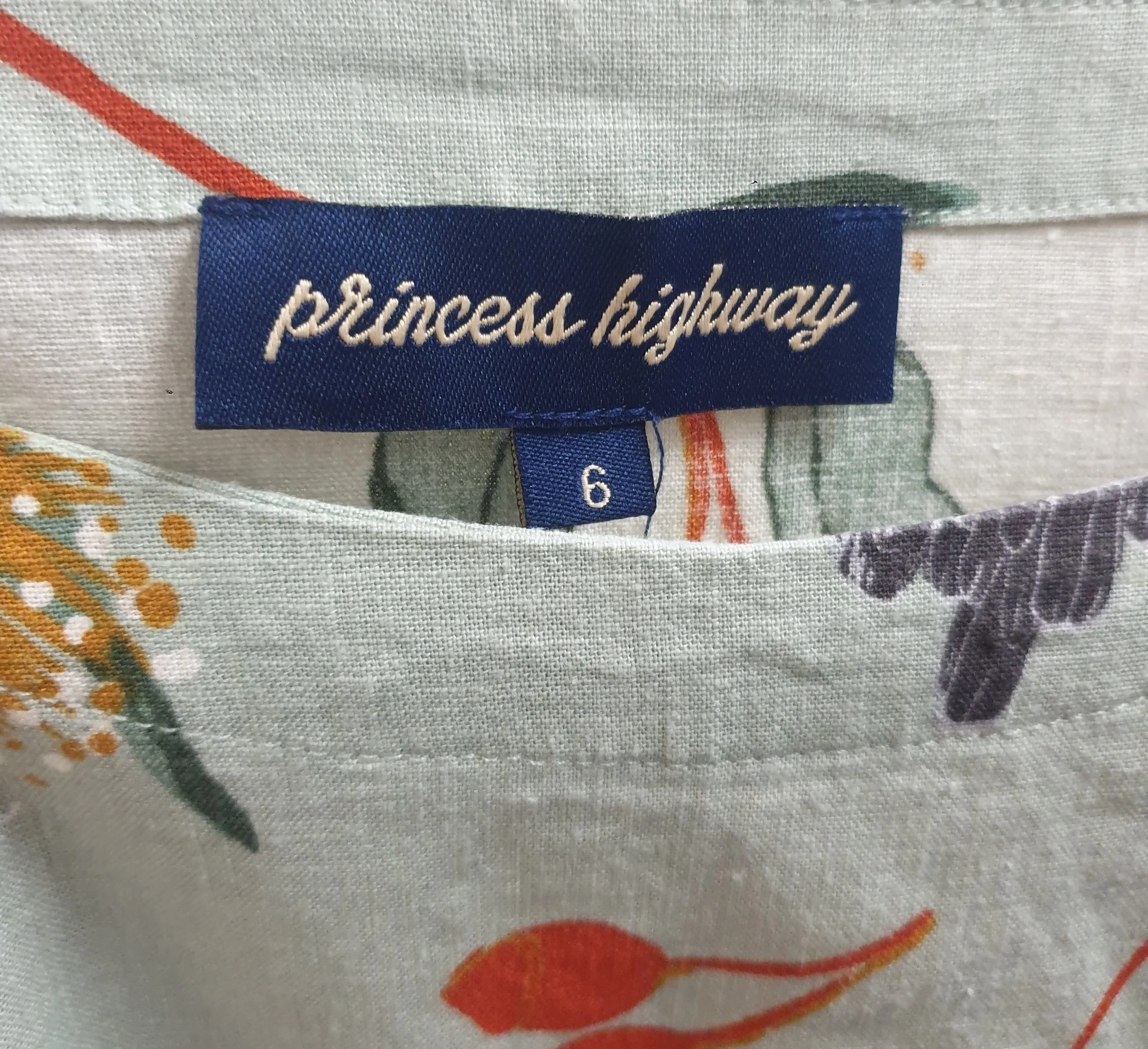 Princess Highway green top with galah print size 6, fits 6 and 8
