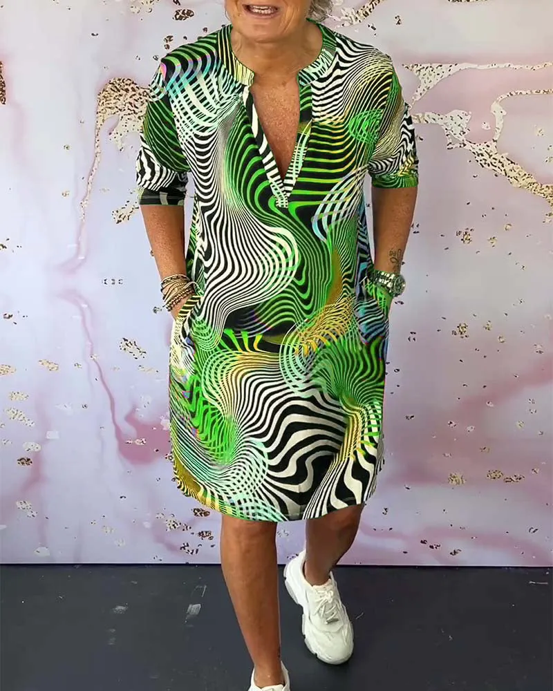 Ria™ | Colorful V-neck dress