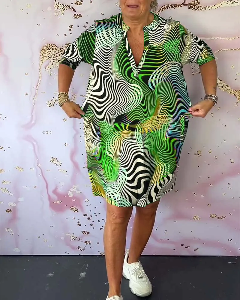 Ria™ | Colorful V-neck dress
