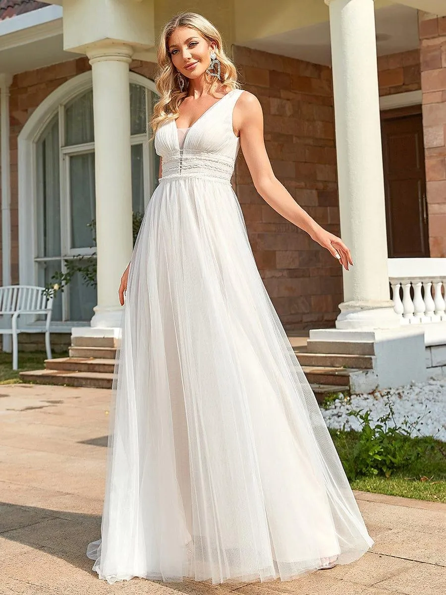 Robe de mariée longue sans manches en V profond et dos bas