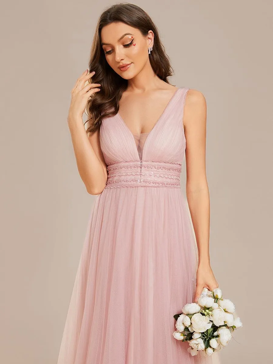 Robe de mariée longue sans manches en V profond et dos bas