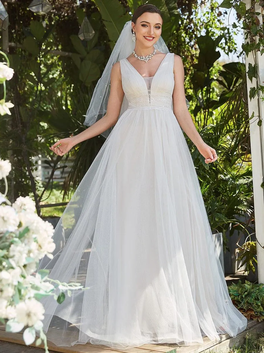Robe de mariée longue sans manches en V profond et dos bas