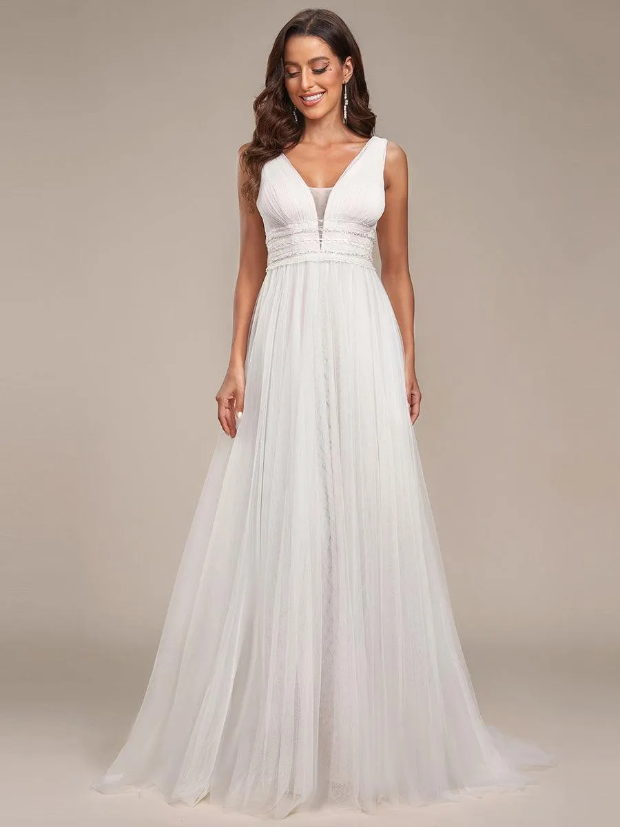 Robe de mariée longue sans manches en V profond et dos bas