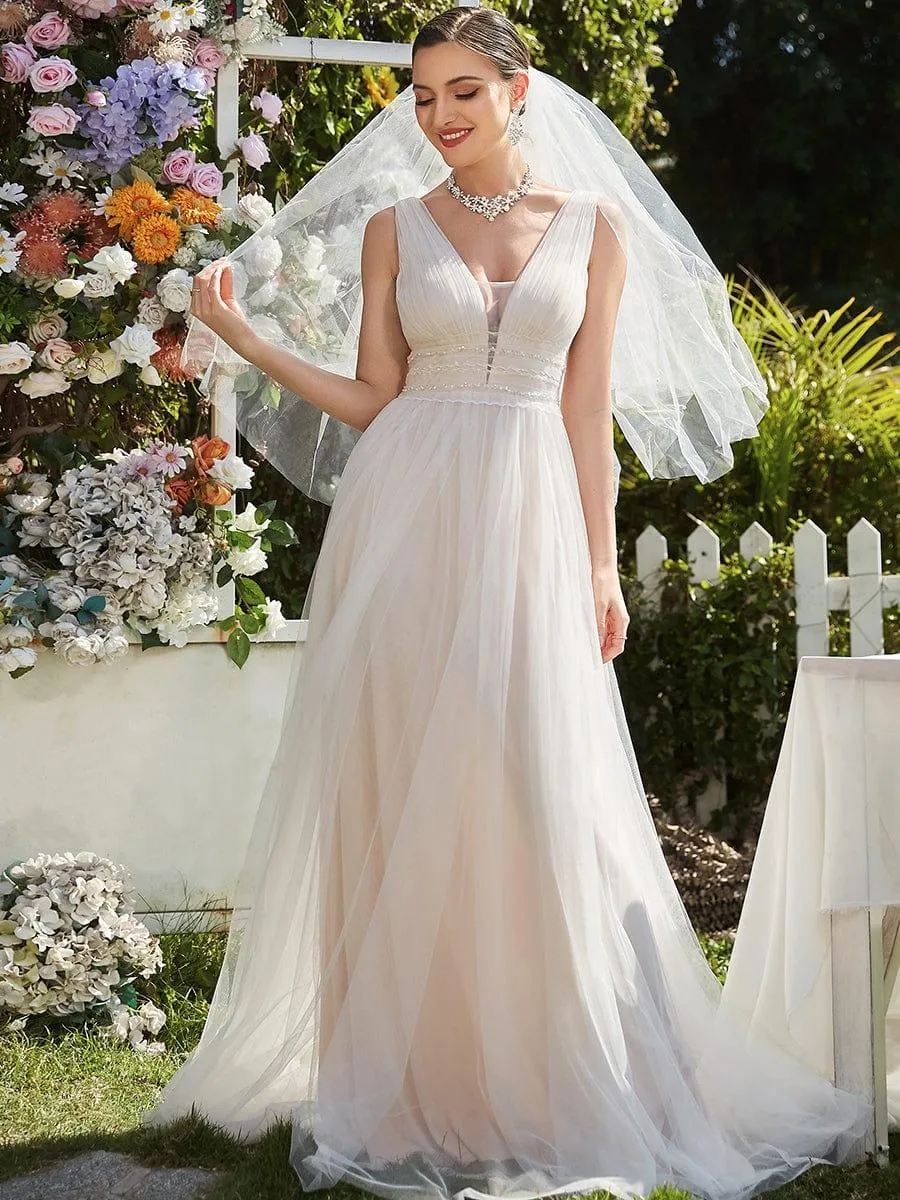 Robe de mariée longue sans manches en V profond et dos bas