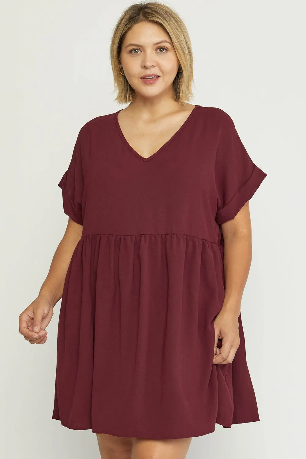 Solid textured v-neck short sleeve babydoll dress