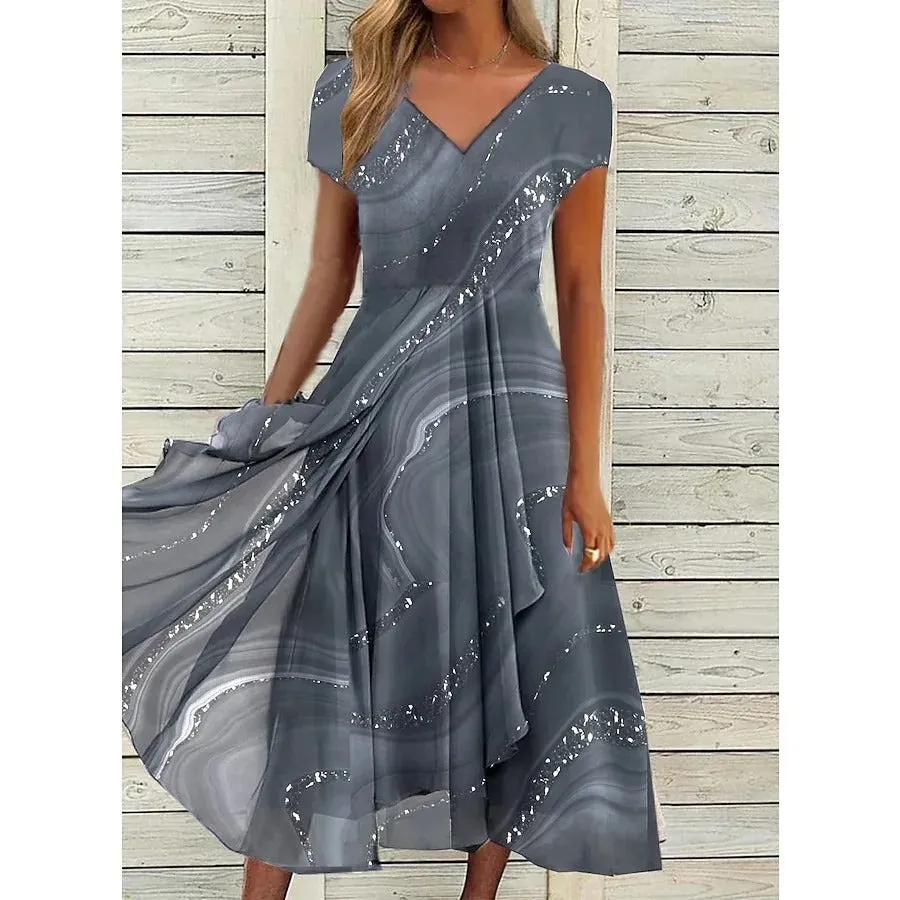 Stella™ | Midi dress with whirl pattern and V-neck